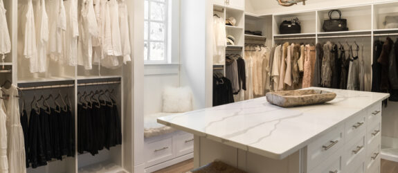 walk-in-custom-closet-with-marble-island
